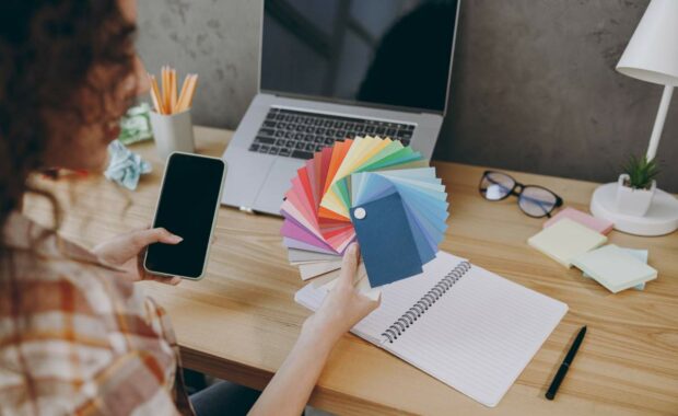 Image of a person painting an office space
